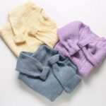 Cozy comforts: essential sweaters, sweatshirts, and cardigans for newborns